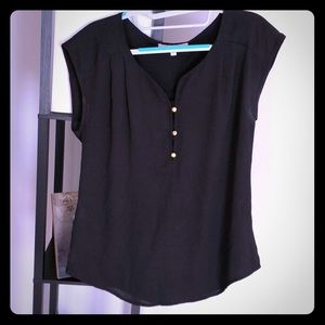 Daniel Rainn black shirt with gold buttons